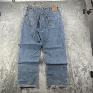 Levi's 550 Jeans Mens 38x30 Blue Med Wash Relaxed Tapered Distressed Denim